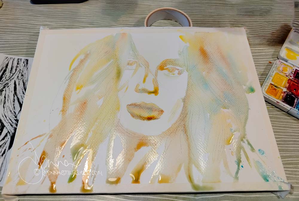 First wash for a watercolour portrait using a tilted board.