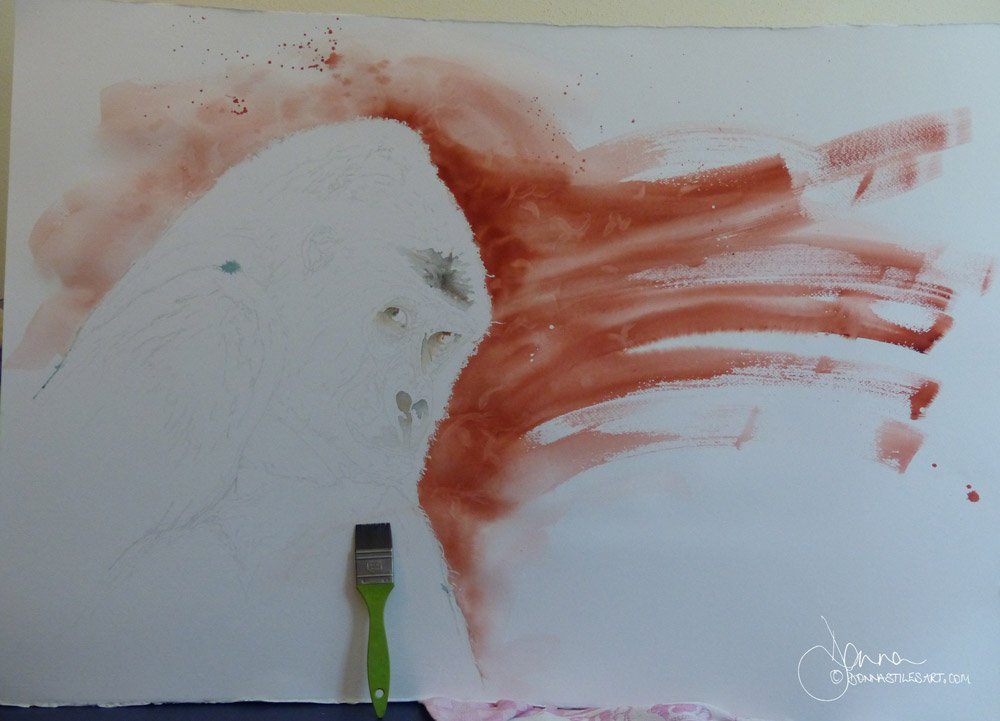 Watercolor background for the portrait in Red Oxide Light is painted on.