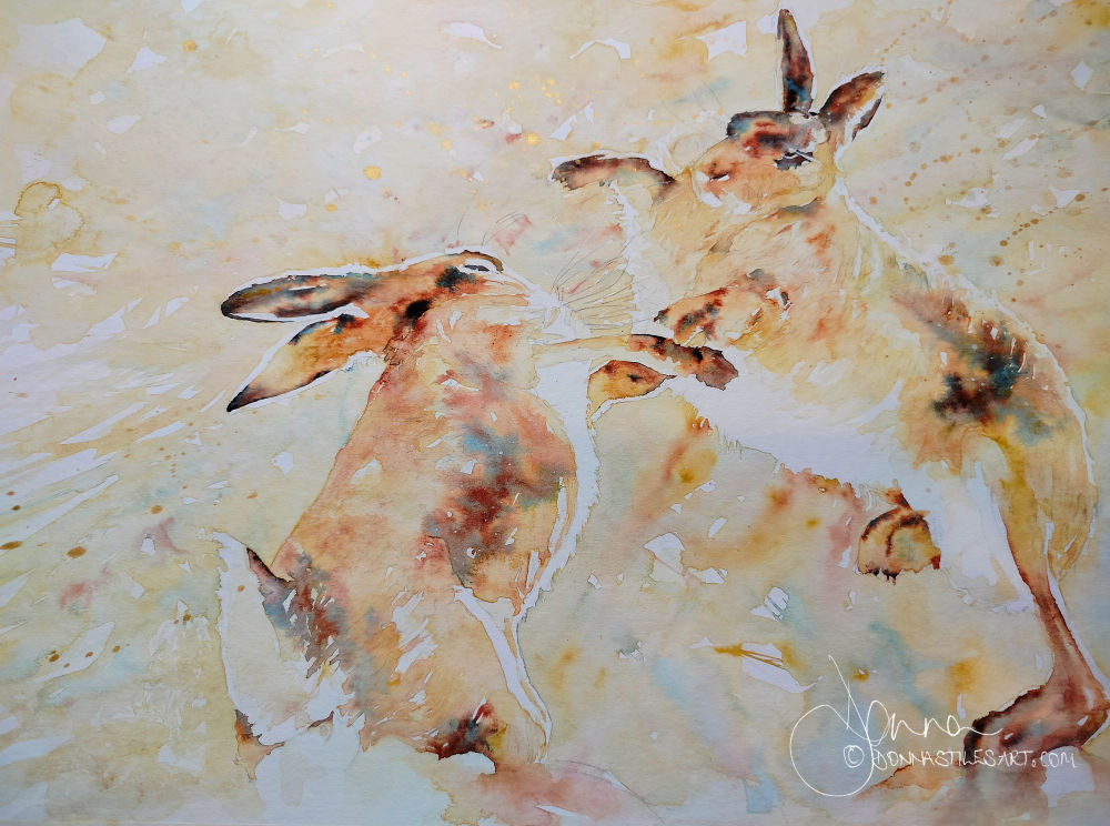 Watercolour hares boxing
